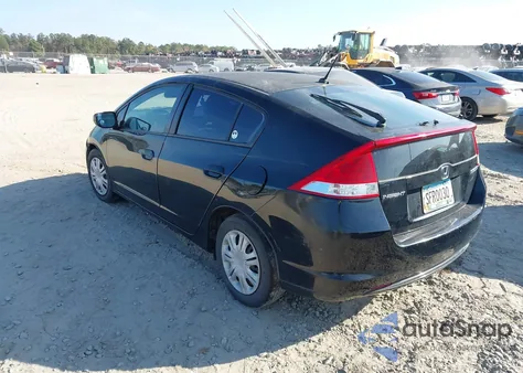 2011 Honda Insight from USA, damaged, VIN JHMZE2H36BS006488